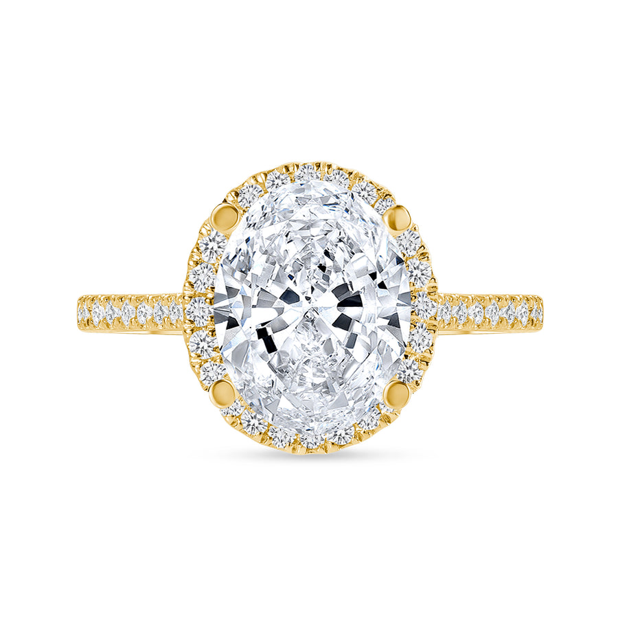 oval cut diamond halo engagement ring with prongs yellow gold