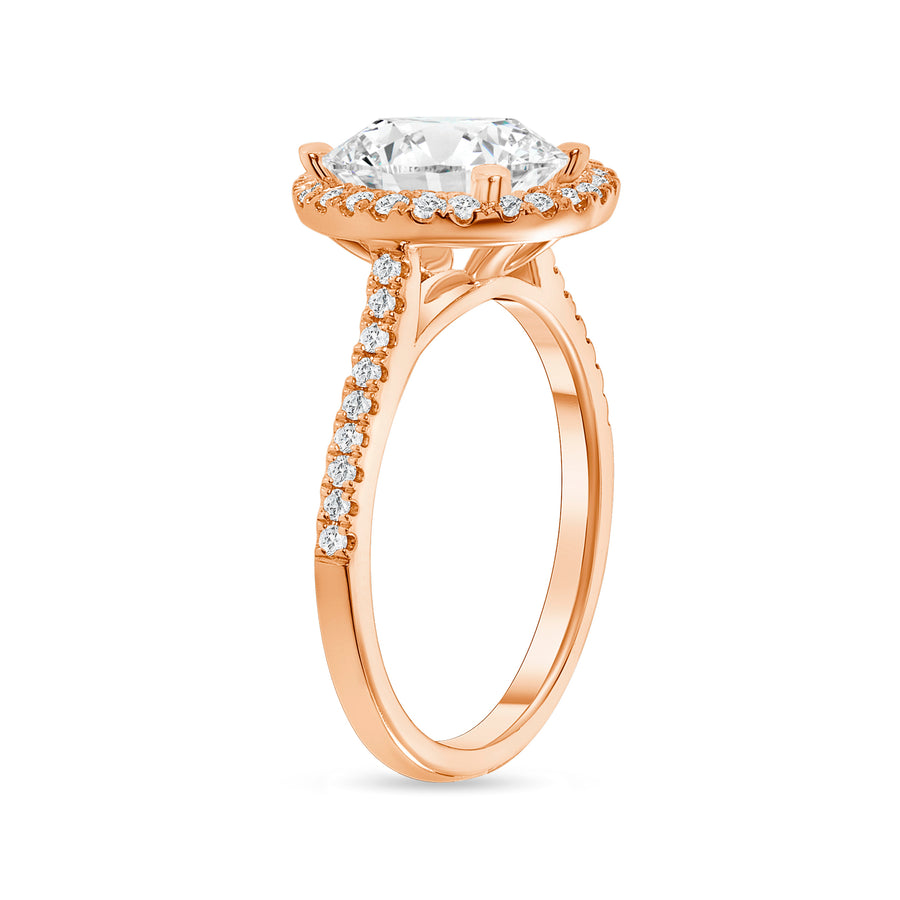 oval cut diamond halo engagement ring with prongs rose gold