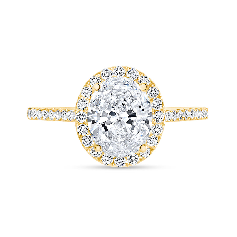 classic oval cut diamond halo engagement ring yellow gold